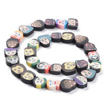 BS0085 Bead Strand Polymer Clay Faces Mixed 10-14x10-15x4mm Approximately 30 Pieces Per Strand